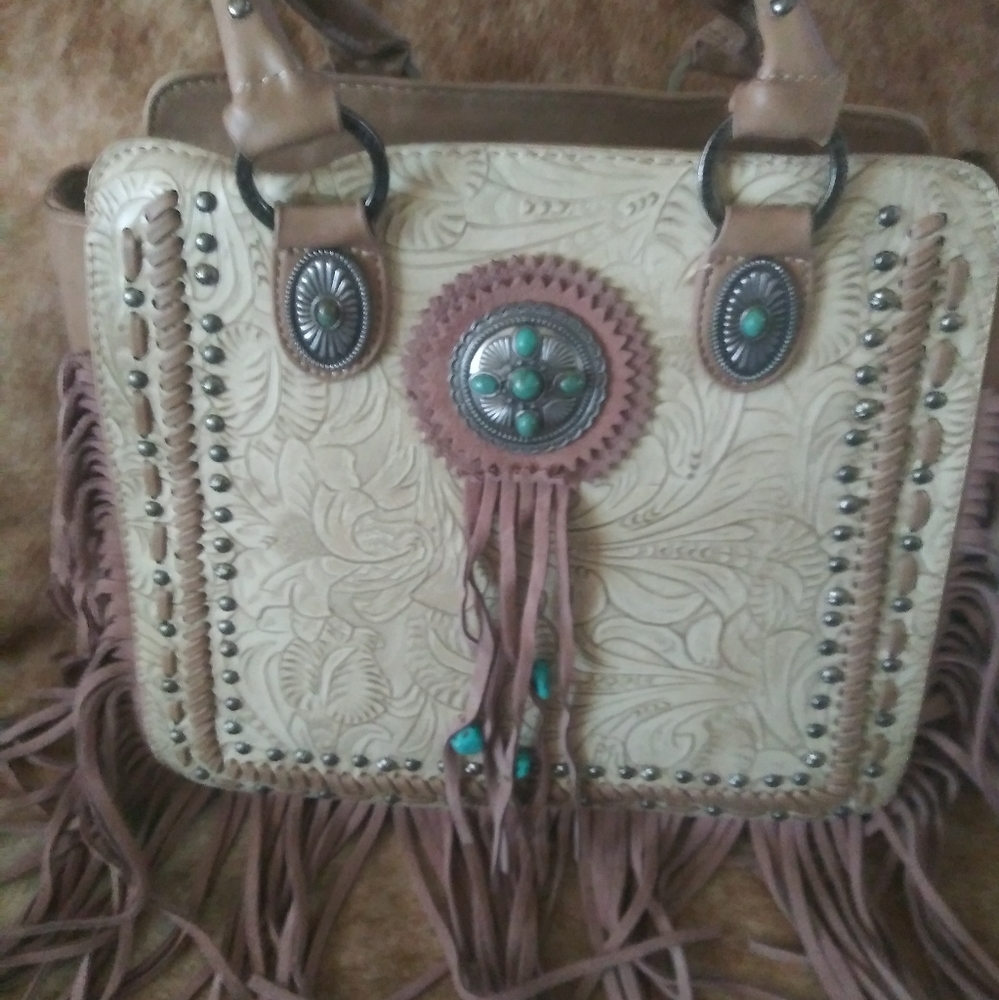 Fringed genuine leather purse